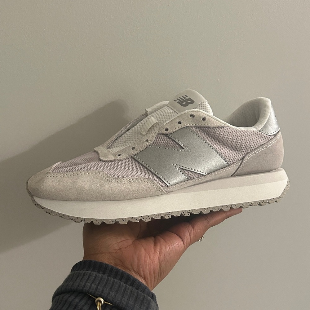 New Balance Metallic Silver and Off-White Sneakers